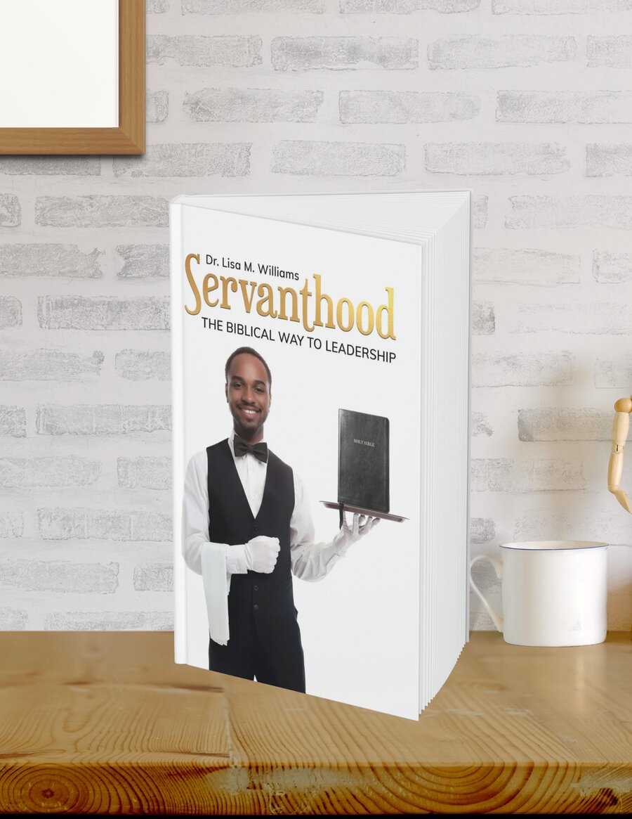 Servanthood: The Biblical Way to Leadership, hardcover edition standing on a desk